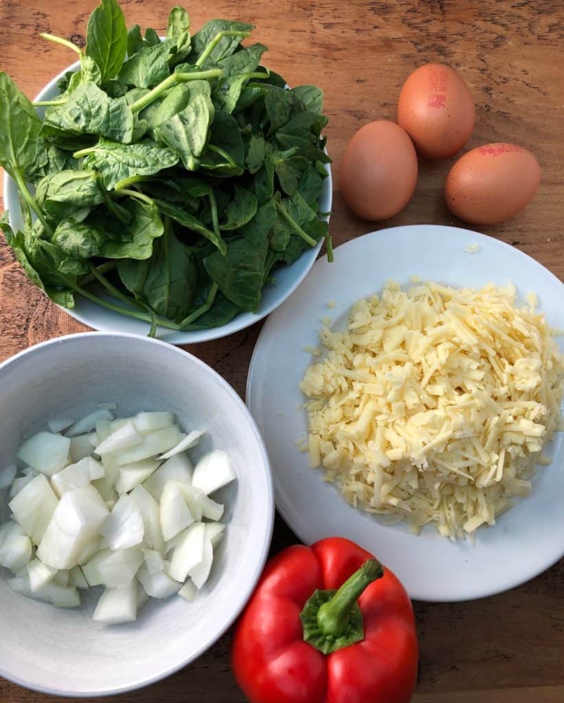 quiche ingredients onion, cheese pepper spinach eggs