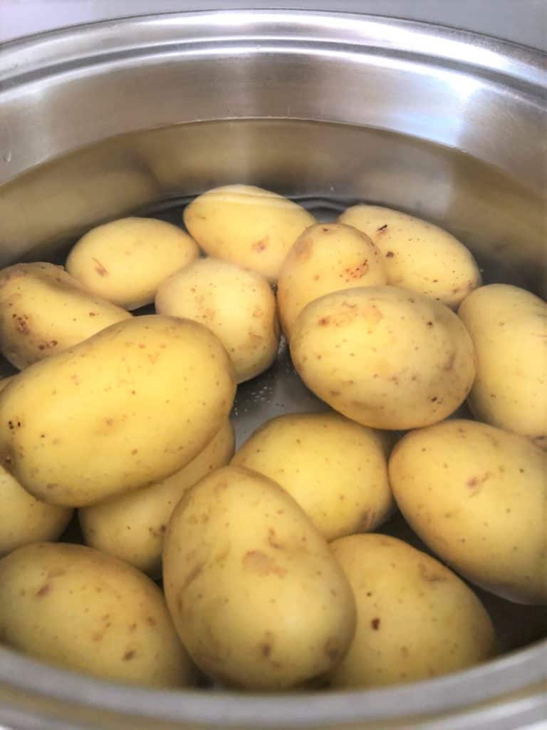 new potatoes in a pan of water
