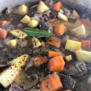 beef stew with bay leaf simmering
