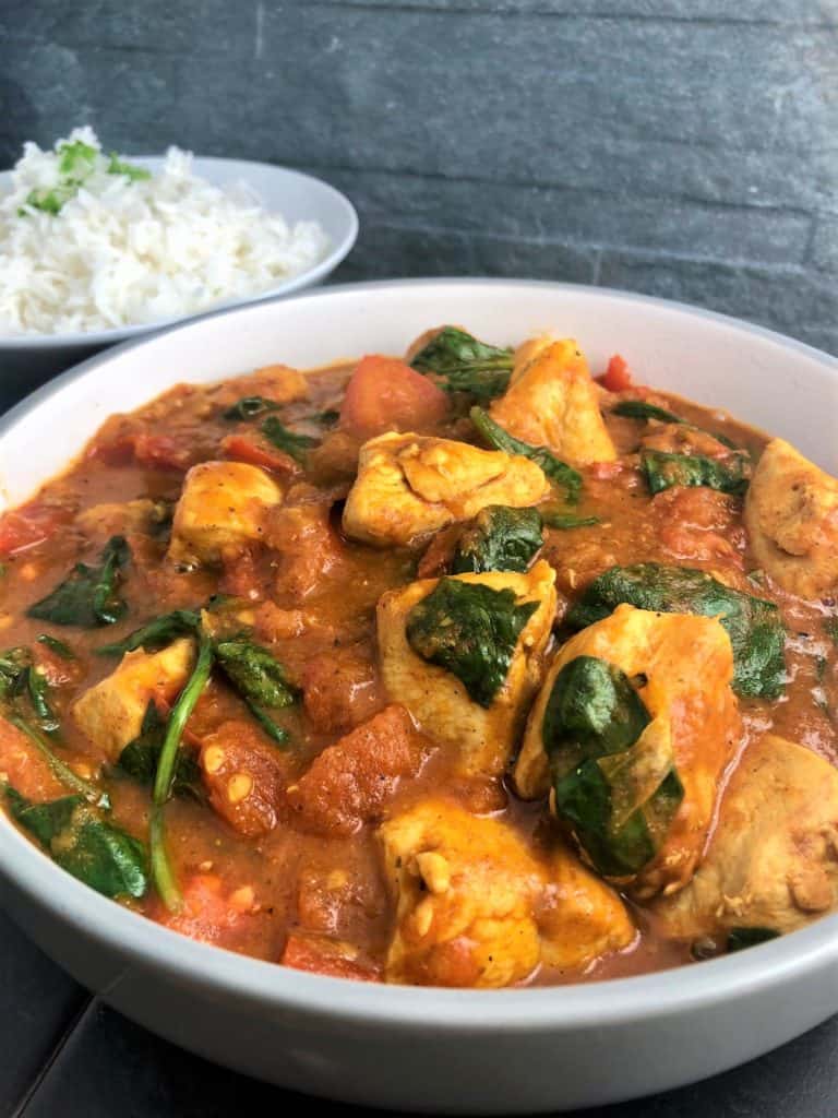 Easy Chicken Balti Curry Recipe in bowl with rice on side