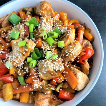 Sweet and sour pork with sesame seeds
