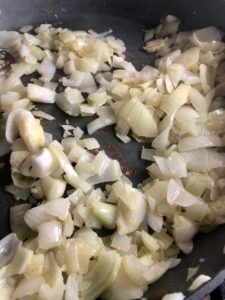 chicken balti onions in pan