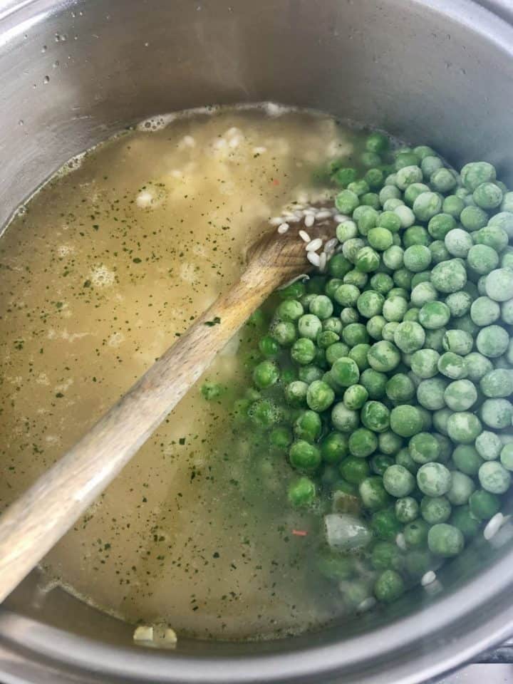 peas added to stock and rice