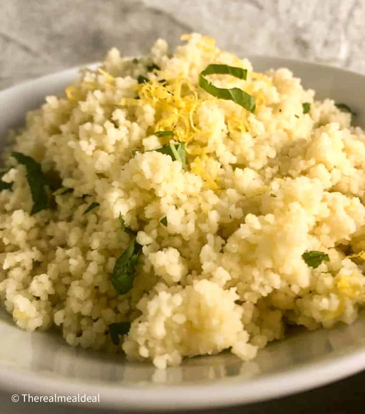 lemon couscous sprinkled with fresh parsley