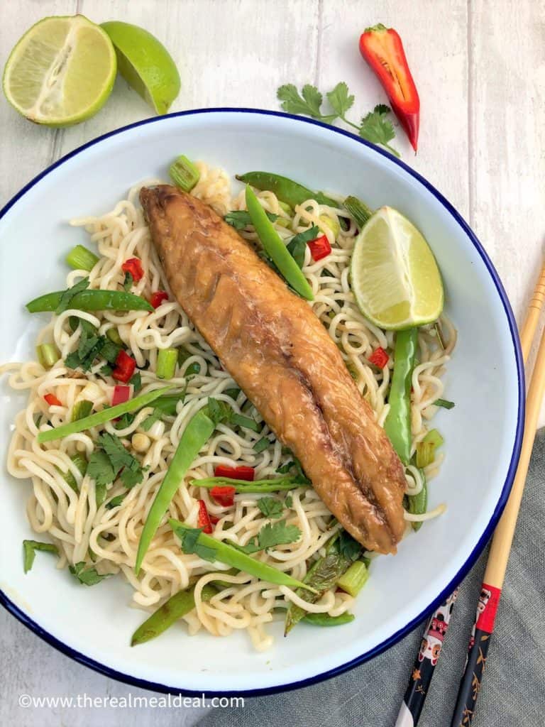 smoked mackerel salad with noodles mangetout spring onions red chilli chopsticks to side and fresh lime and red chilli