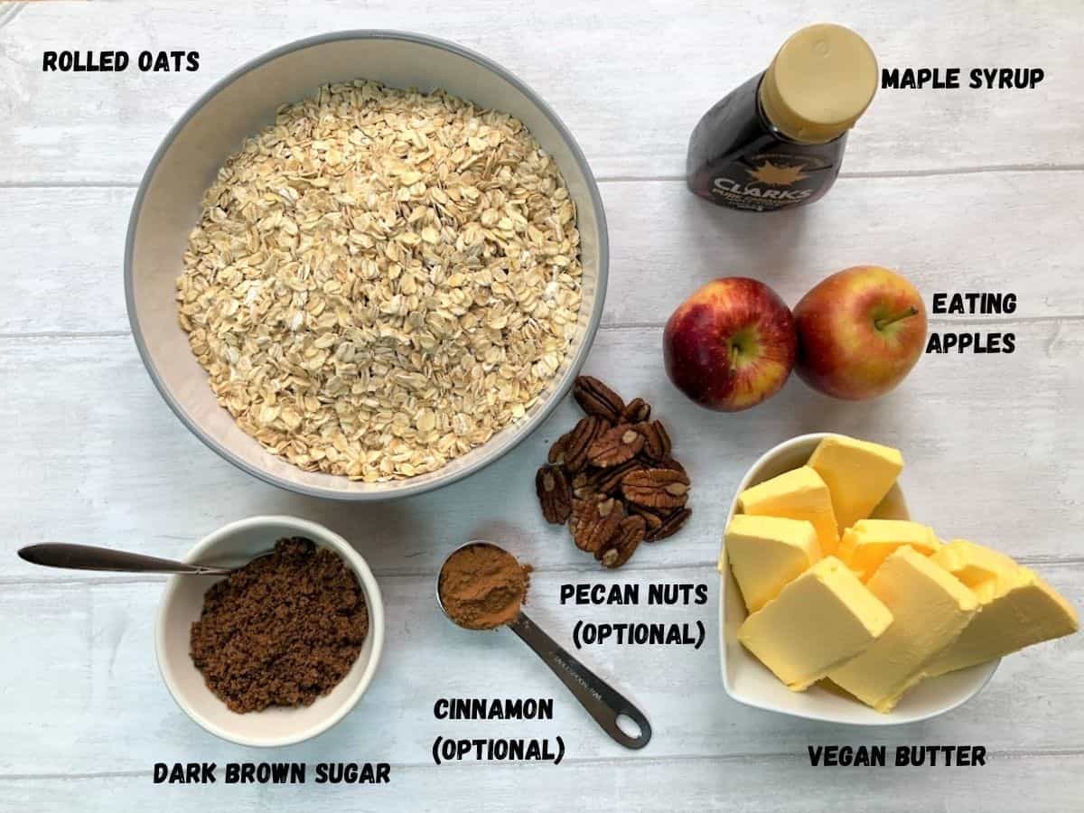 indredients for Vegan apple and maple syrup flapjacks rolled oats maple syrup eating apples vegan butter pecan nuts (optional) cinnaon (optional) dark brown sugar