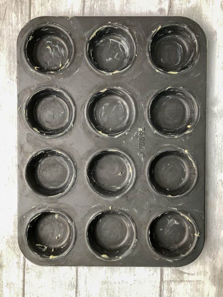12 hole baking tin greased with butter including around the edges