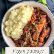 vegan sausage casserole in dish with mashed potato image for pinterest