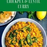 bowl of lentil and chickpea dahl with spianch pinterest pin
