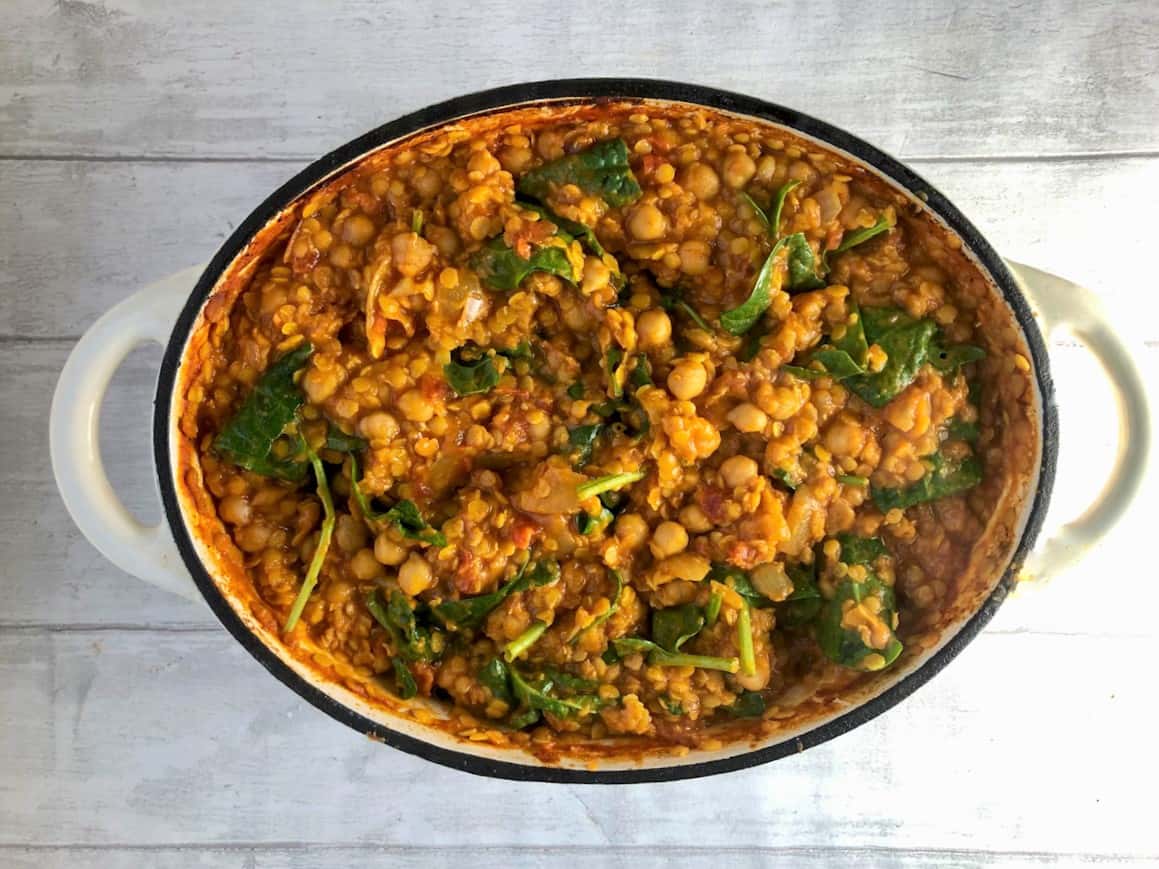 fresh spinach and lemon juice stirred through chickpea and lentil curry.