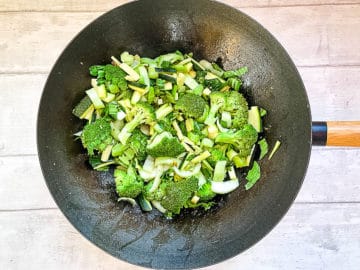 broccoli courgette and pak choi in wok